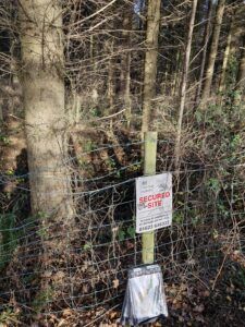 Fenced off coal pit
